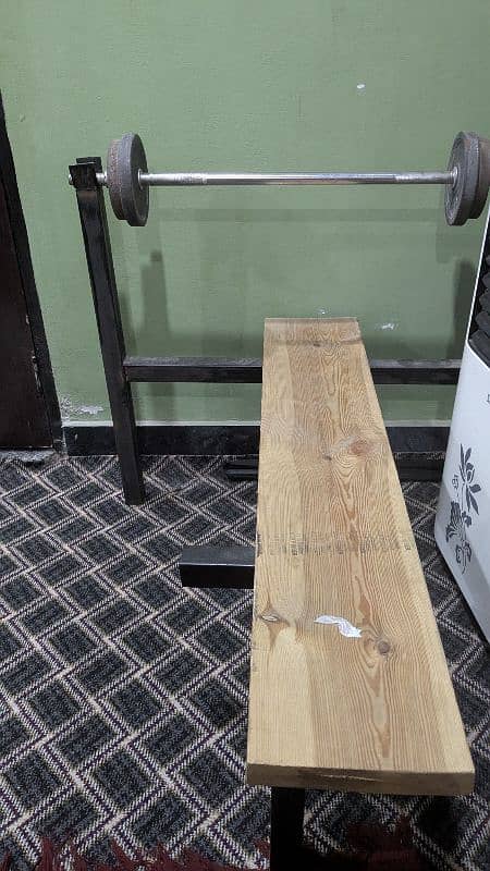 Bench press and Barbell bar with weights 1