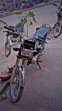 Honda 125, black, 2022-23 model.