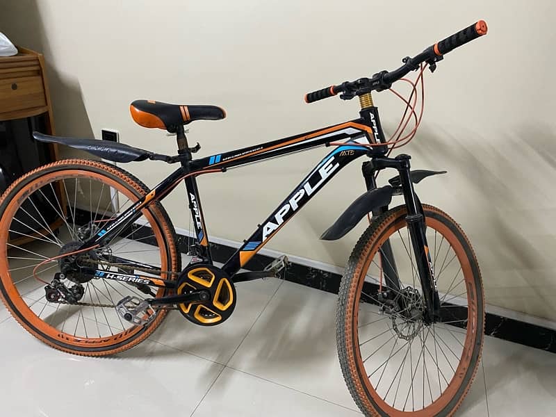 Orange bicycle for sale 0