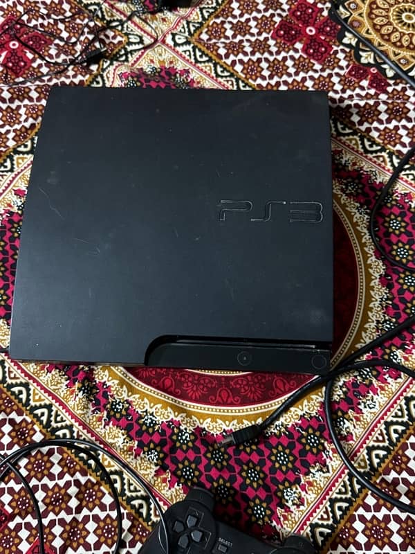 PlayStation 3 slim with 2 wireless controllers and 9cds all working 5