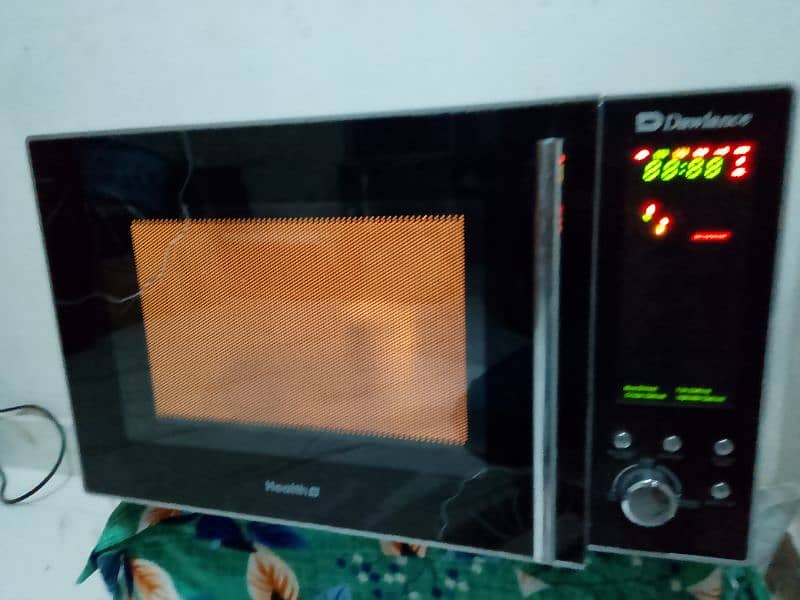 Dawlance 2 in 1 grill + microwave oven with stand 2 days warranty 5