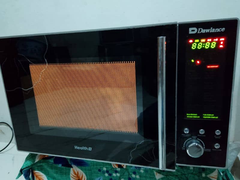 Dawlance 2 in 1 grill + microwave oven with stand 2 days warranty 7