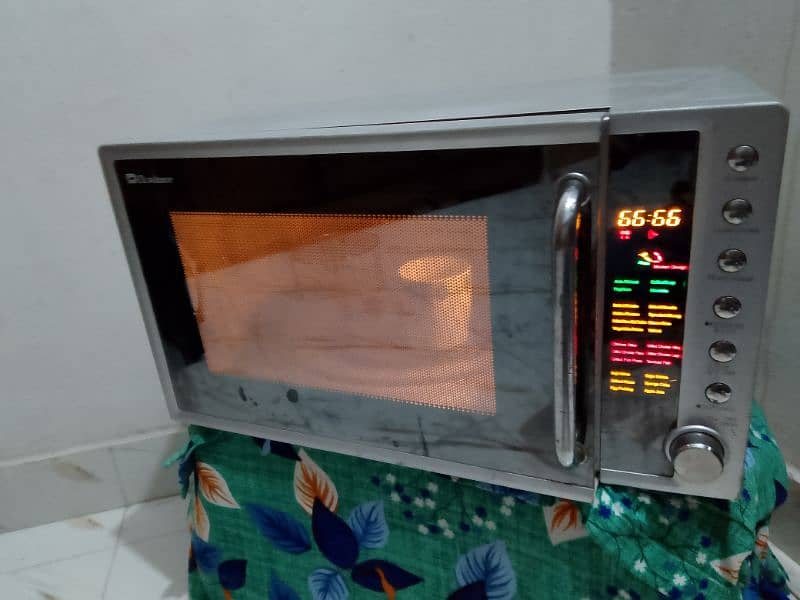 Dawlance  2 in 1  microwave oven grill  large size 2 days warranty 5