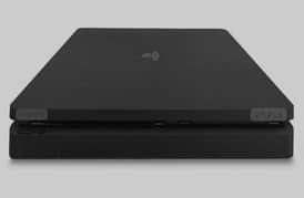 PS4 slim (1TB) with two controllers and a cd.