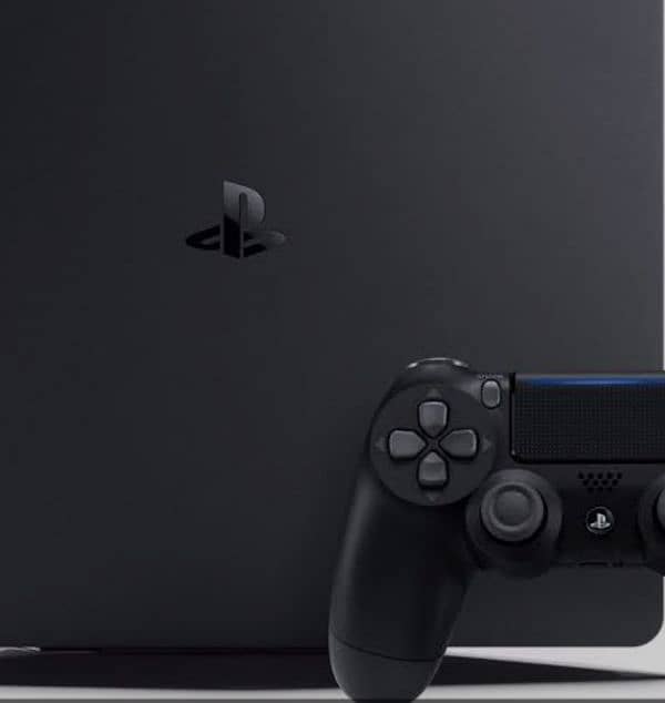 PS4 slim (1TB) with two controllers and a cd. 1