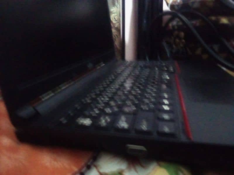 Laptop ok ha aur Fujitsu company ha 2