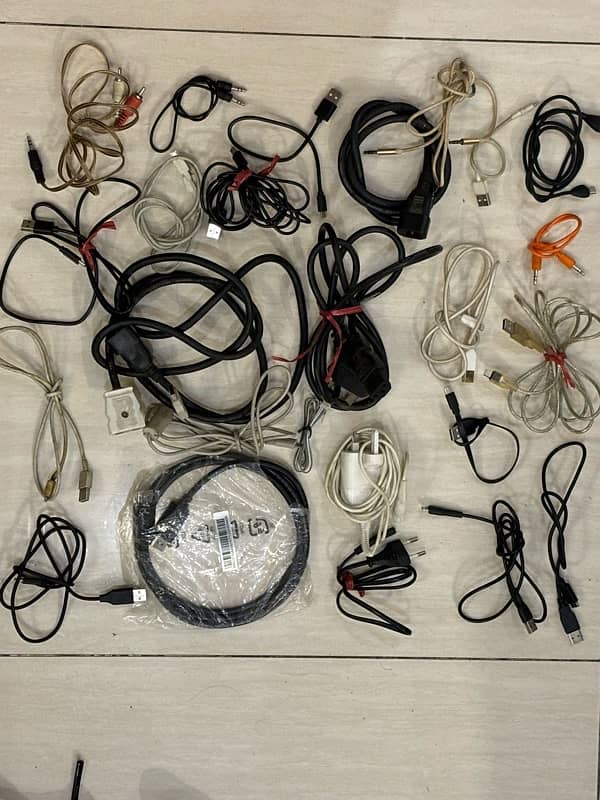 assorted cables,adopter and charger 0