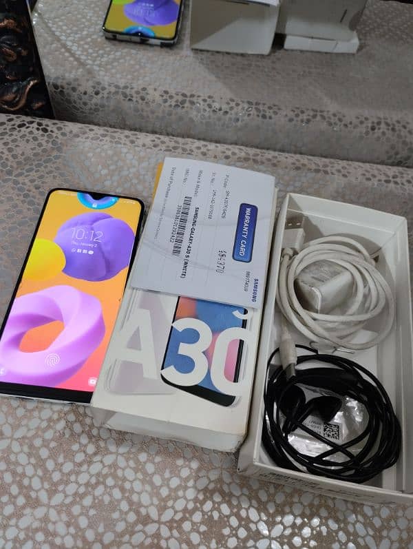 Samsung a30s white colour 4gb 64gb pta approved 0/3/1/3/4/1/1/6/9/8/4 14