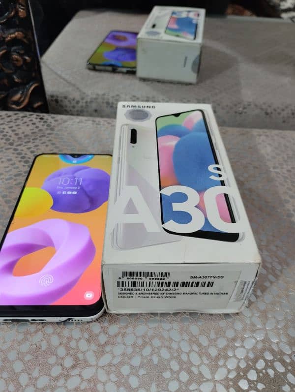 Samsung a30s white colour 4gb 64gb pta approved 0/3/1/3/4/1/1/6/9/8/4 15