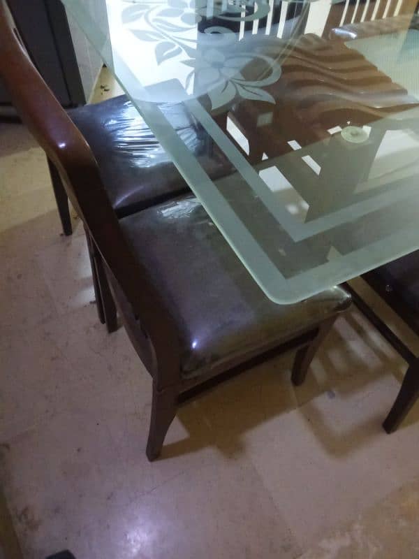 Dining table with eight chairs woodin just like new 3