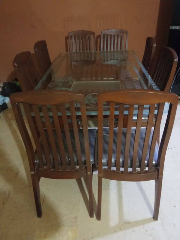 Dining table with eight chairs woodin just like new 10