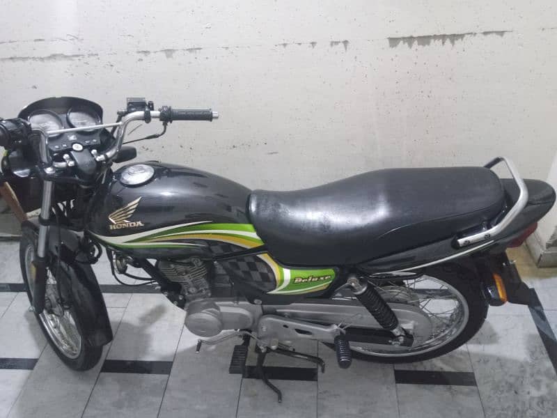 Honda deluxe mobile number 032157 27956 0