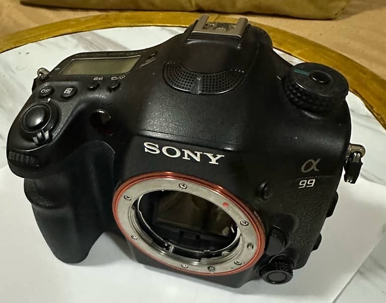 Sale: Sony APLHA A99 (Body) with Lenses** 6