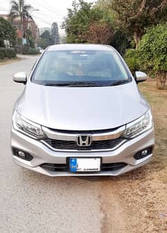 Honda City 1.5Aspire CVT full option First owner total Genuine