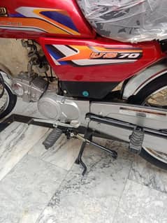 United 70cc Red Colour Brand New only 650 km Running.