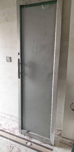 Aluminium door. size 25 × 78 inches