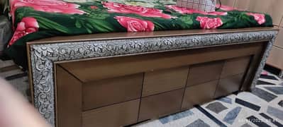 wooden bed with dressing n side tables