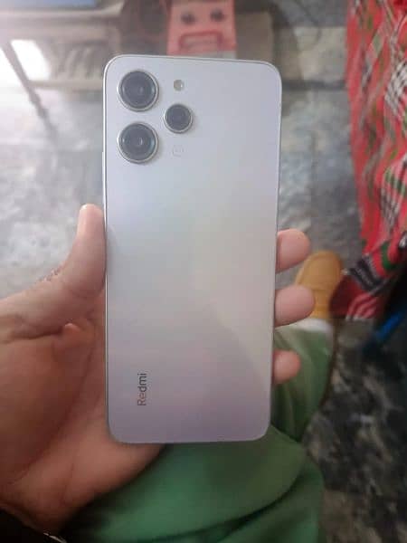 Redmi 12 8/128 with box and charger. 1