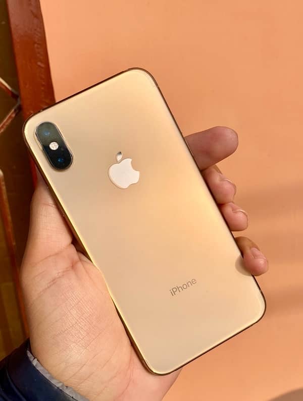 iphone xs gold 64gb factory unlock. waterpack 2