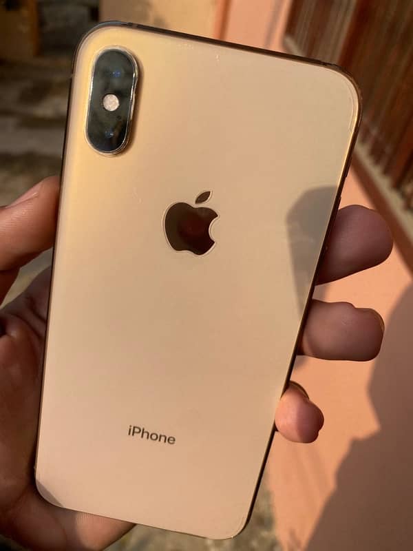 iphone xs gold 64gb factory unlock. waterpack 4