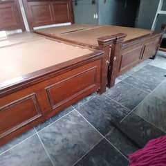 wooden double bed