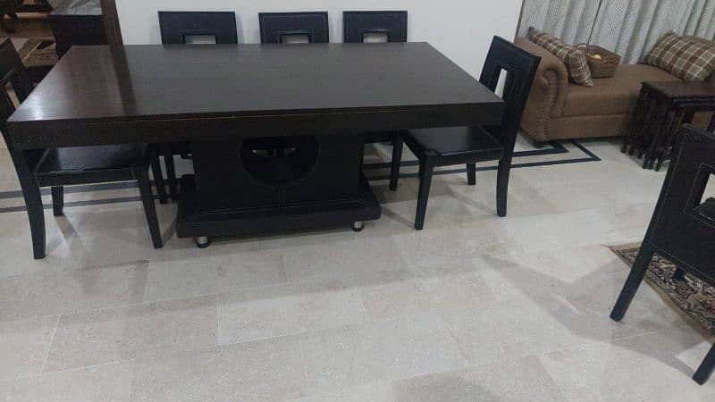 8 seater dinning table made in Malaysia with pure wood 1