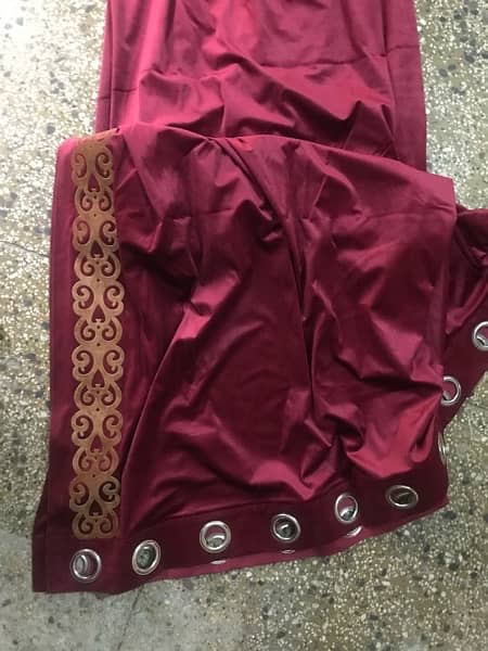 Curtains blackout Maroon Two Panels with rings and Curtain behind 1