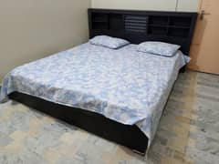 king size bed for sale with side tables and a dressing table