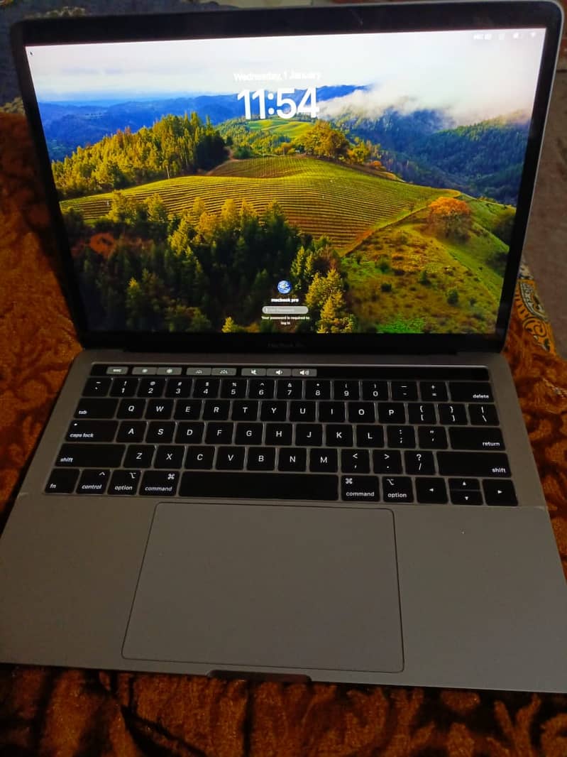 MacBook Pro (13-inch, 2019, Quad-Core i7, 16GB RAM) for Sale 1