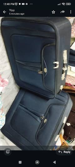 2 different sizes suit cases