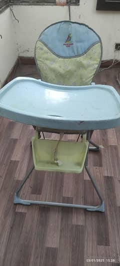 Baby chair with adjustable table for feeding