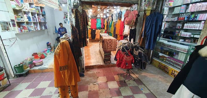 garment business for sale with counter & stands 4