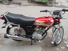 Brand new honda 125 in emaculate condition. (open invoice)