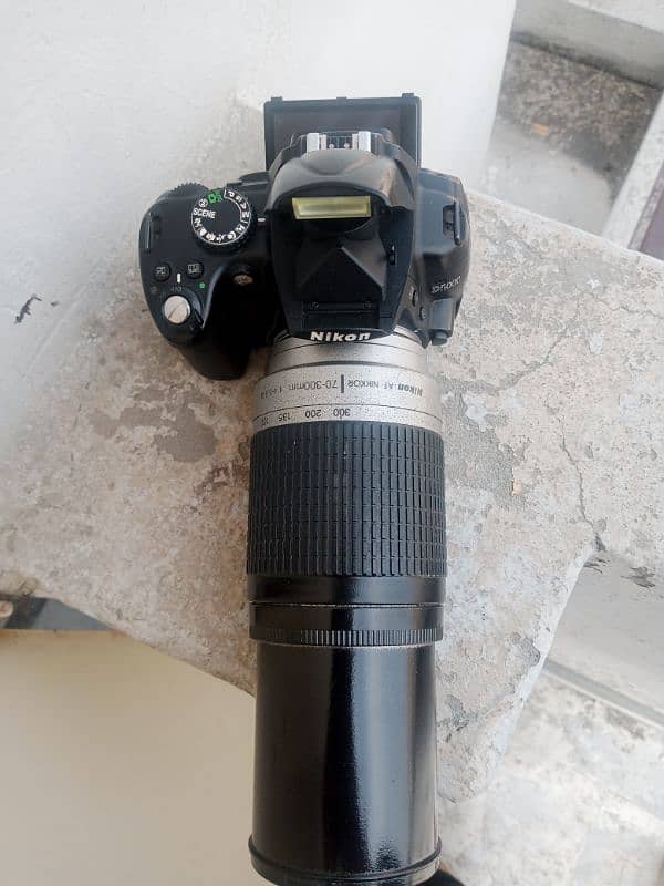 Nikon d5000 with all assesries and 70/300 lense price kum nhi honi 5