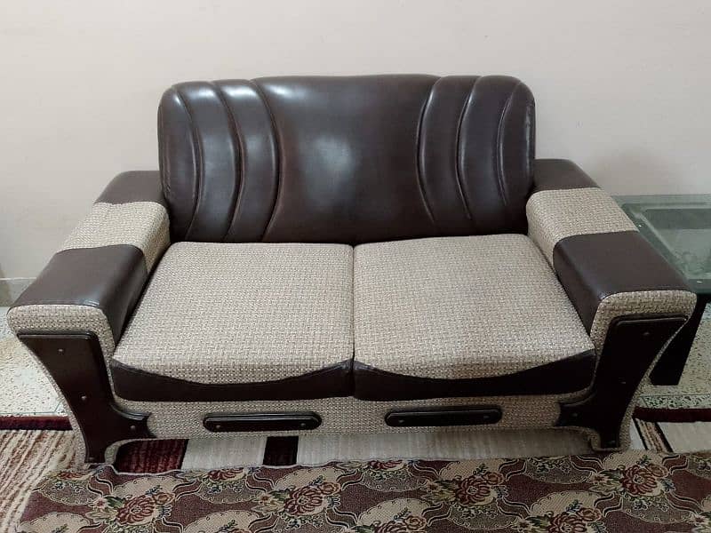 10 seater Brown & Beige sofa set. Rs 65000 4