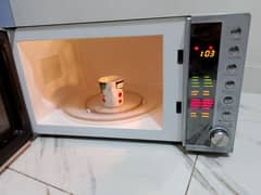 Dawlance microwave oven 2 in 1 grill cooking bhi hote