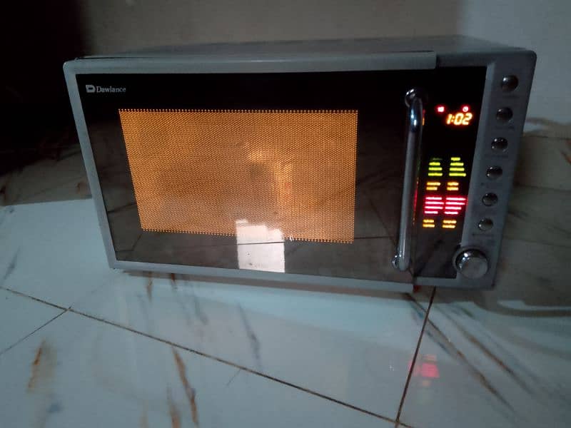 Dawlance microwave oven 2 in 1 grill cooking bhi hote 1