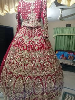 bridal dress heavy work by a designer of Islamabad