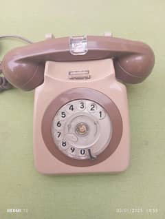 Vintage rolling dial telephone