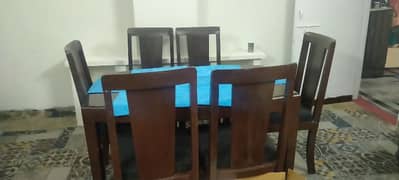 Wooden Dinning table along 6 Chairs