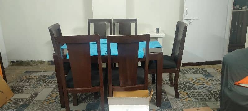 Wooden Dinning table along 6 Chairs 1