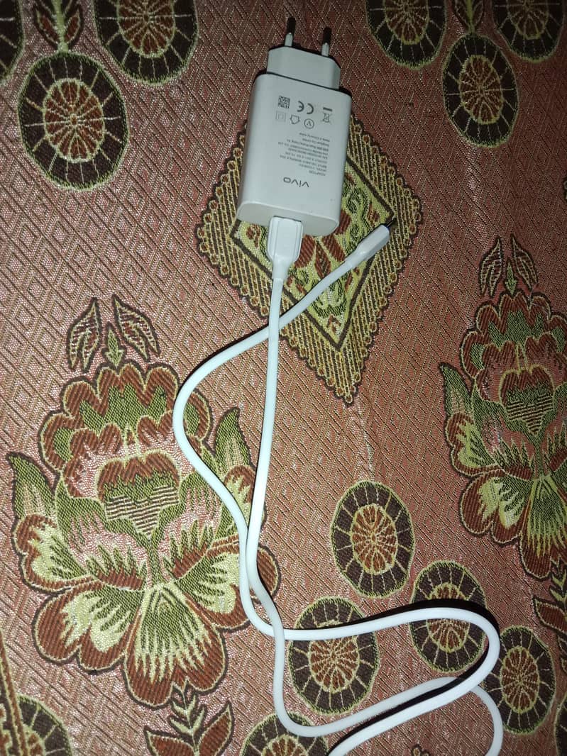 Vivo mobile original charger for sale. 03462532255 contact no 2