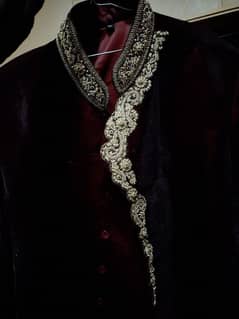 Groom Shirwani Walwet stuff Mehroon color with inner suit and Qulah. .