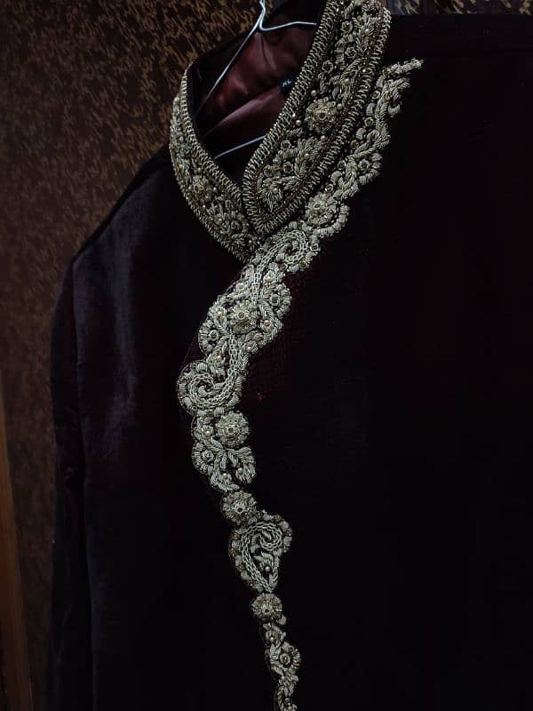 Groom Shirwani Walwet stuff Mehroon color with inner suit and Qulah. . 1