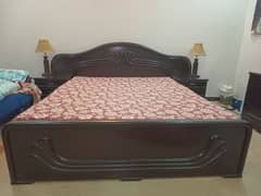 Wooden bed with dresser