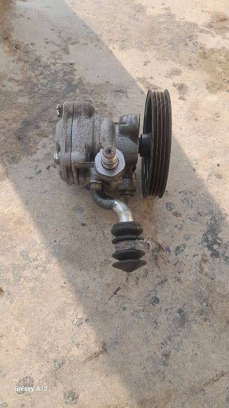 suzuki cultus power pump 1