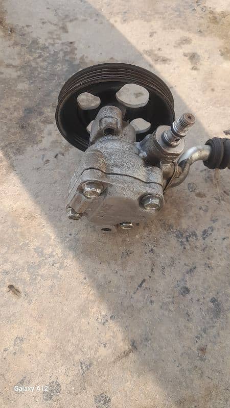 suzuki cultus power pump 4