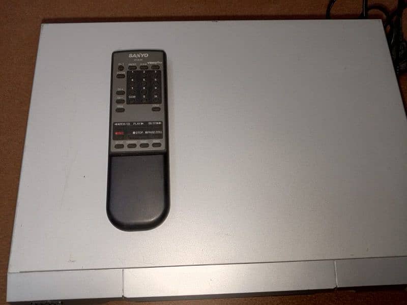 sanyo VCR with remote control & Leeds 0