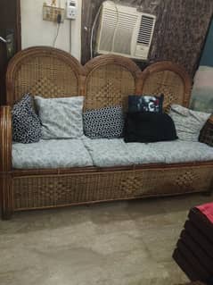 cane sofa