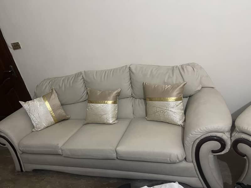 White sofa with table 1